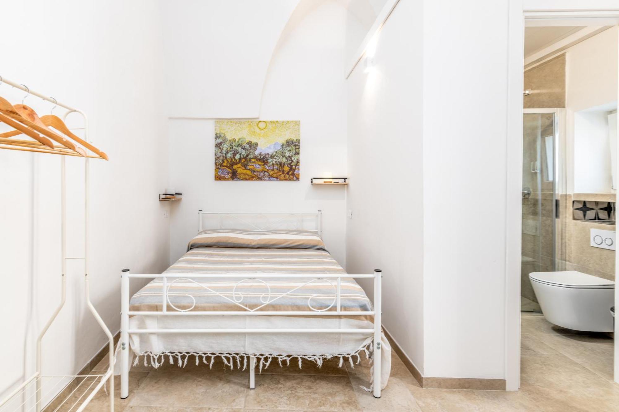 Le Bianche Suites Остуни Стая снимка